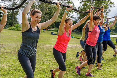 A group of women holding a rope